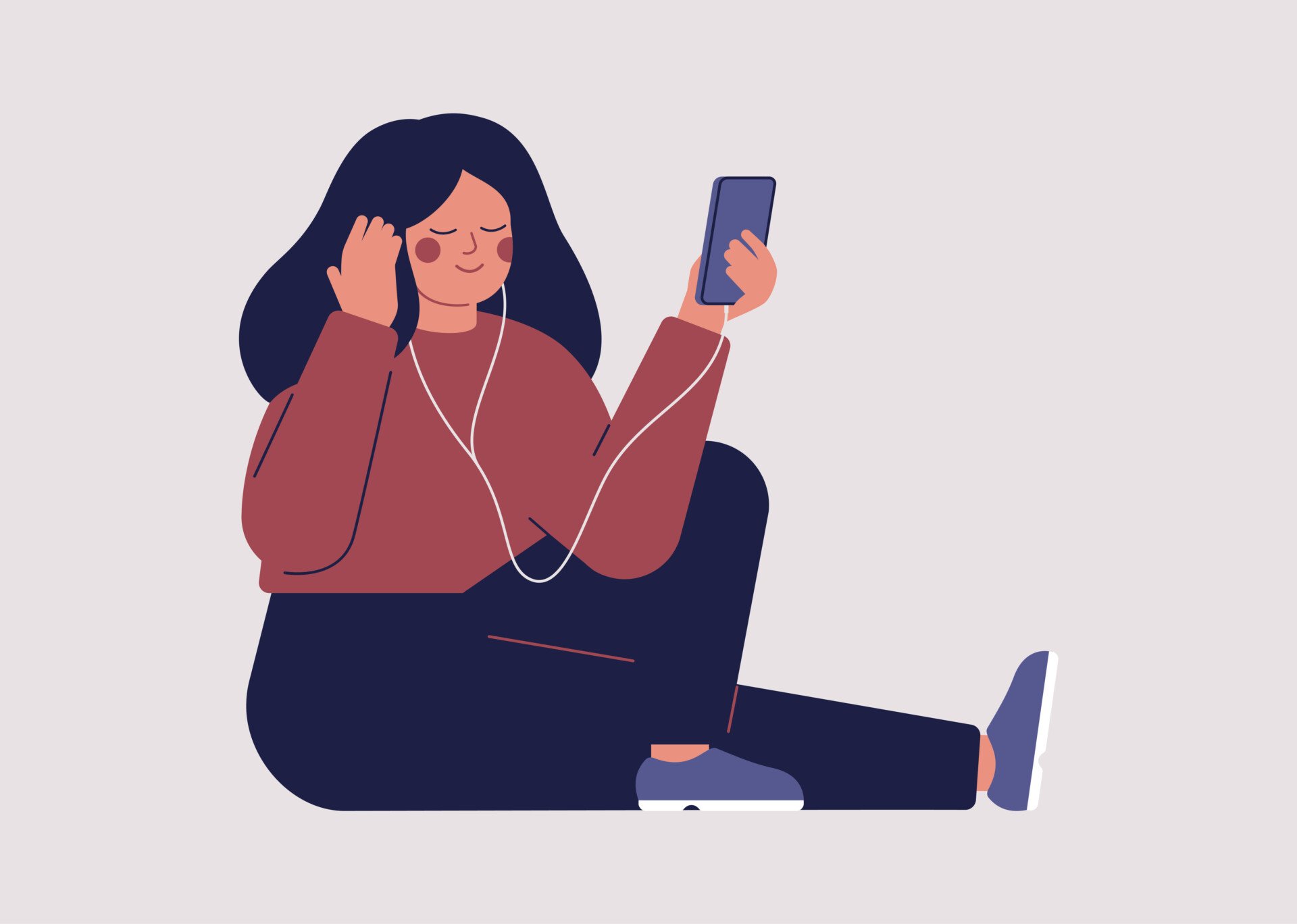 Young woman is listening to music with headphones on her smartphone.